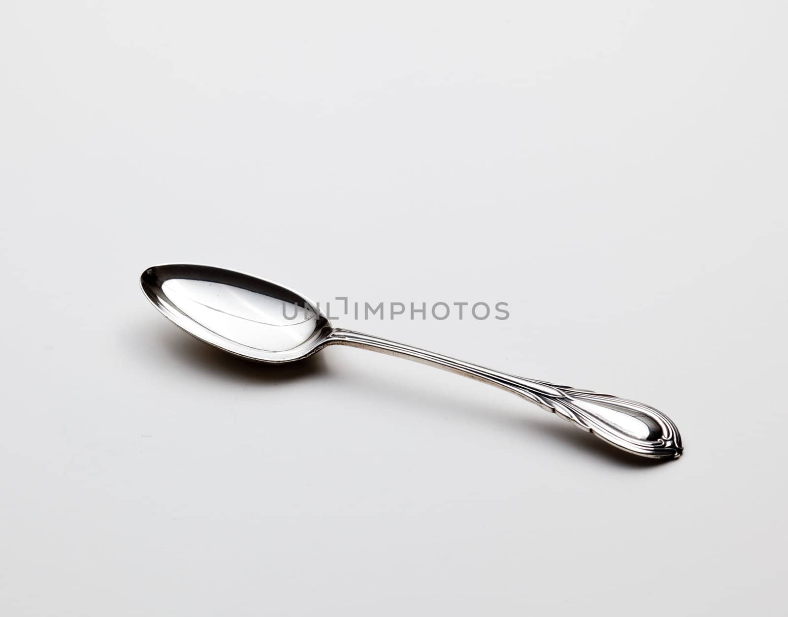 Old fashioned sterling silver object tea spoon or dessert spoon