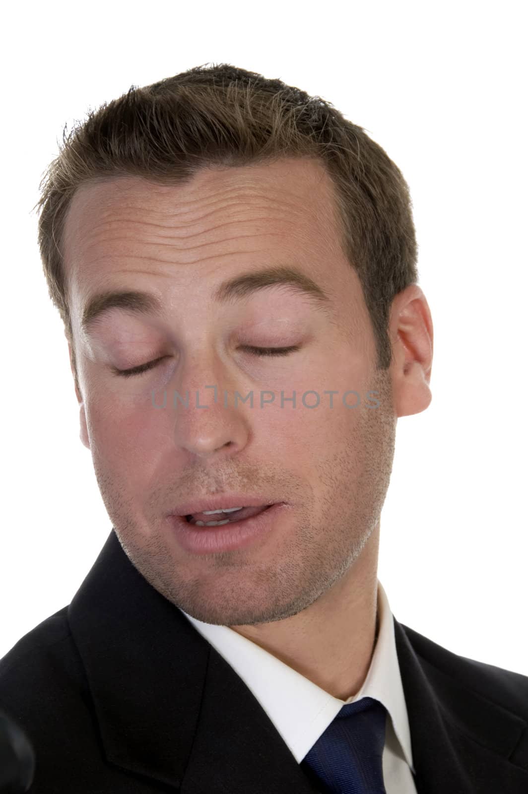 businessman with closed eyes on an isolated background