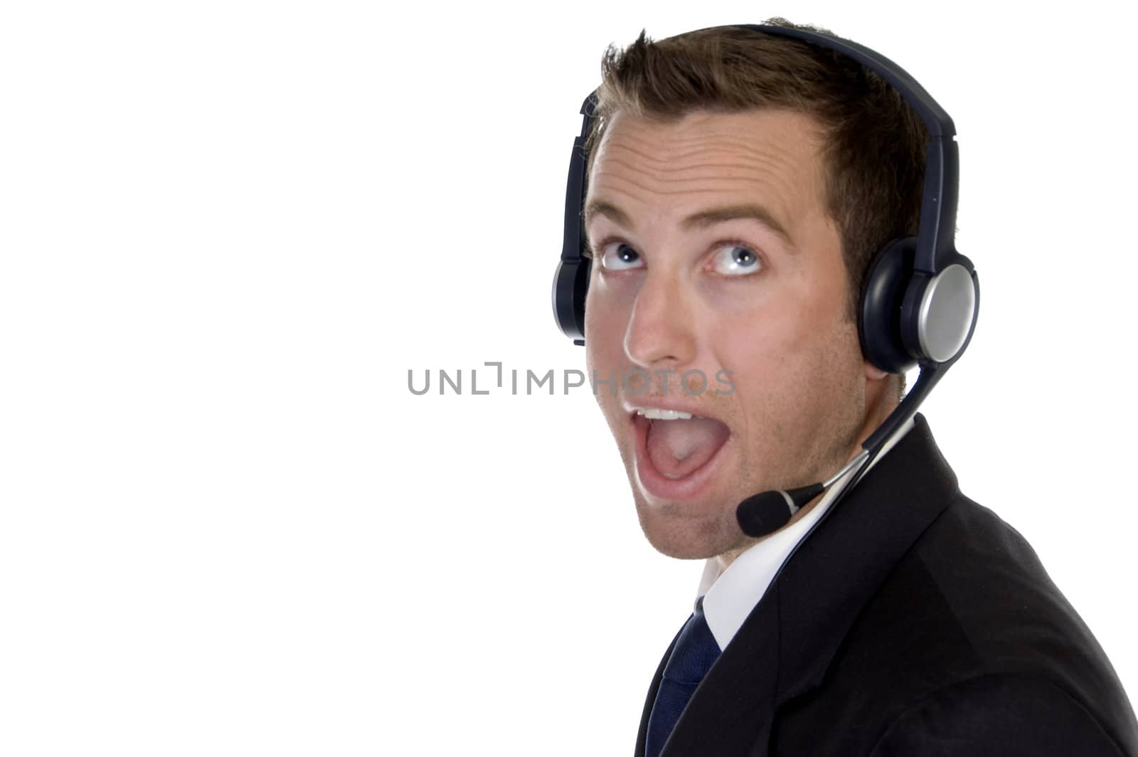 surprised businessman with headphone on an isolated white background