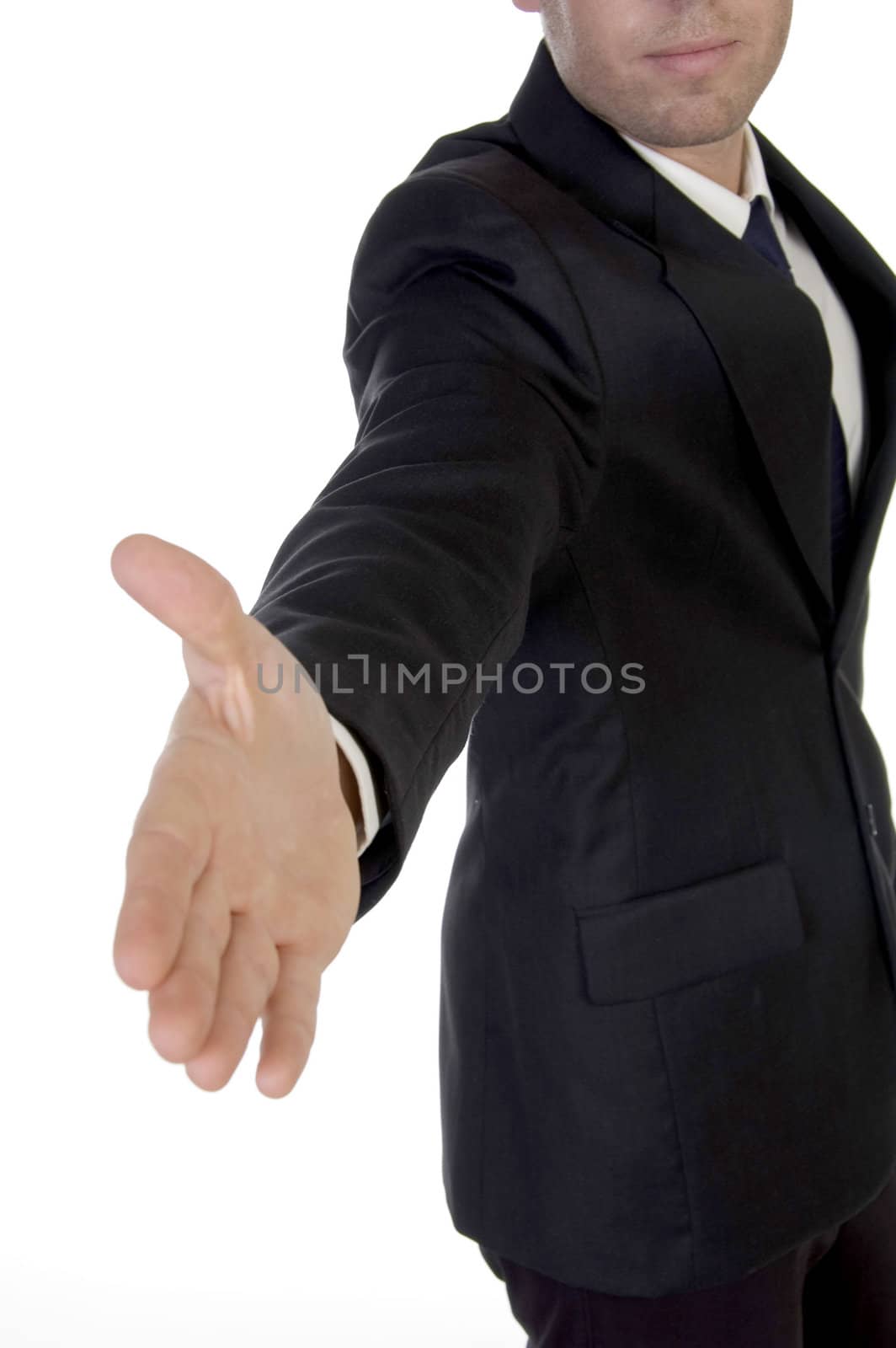 young man in suit offering to shake the hand on an isolated white background