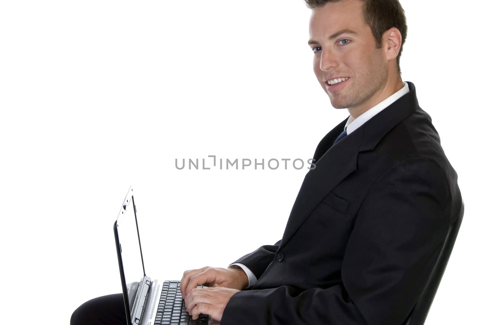 successful businessman with laptop by imagerymajestic