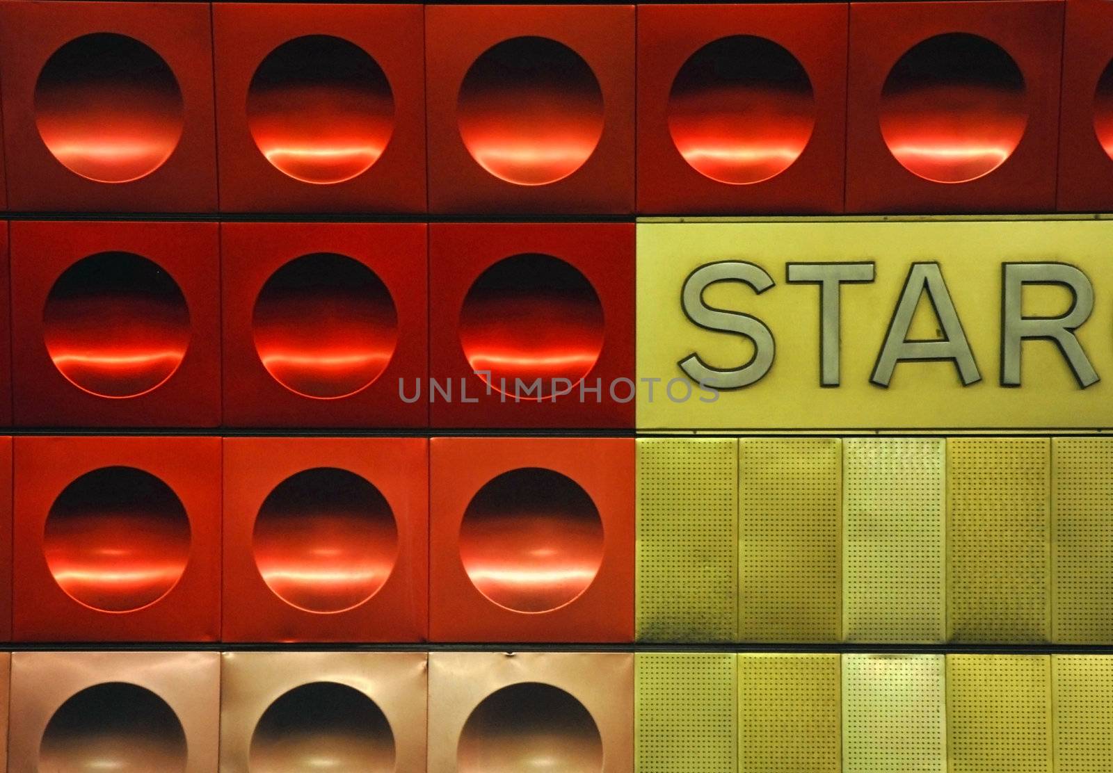 Red and golden circled metal texture with the word star.