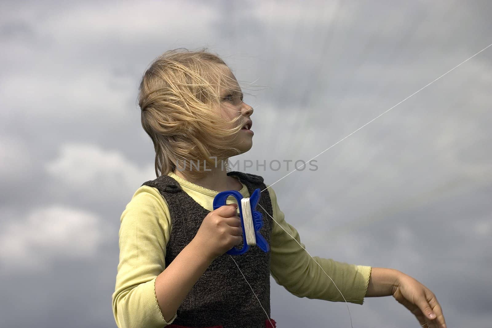 girl with kite in the open air