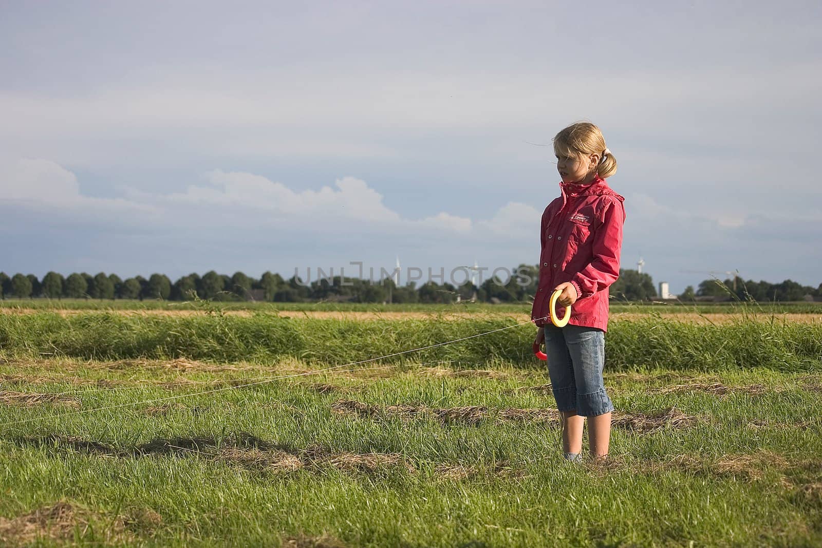 girl with kite in the open air