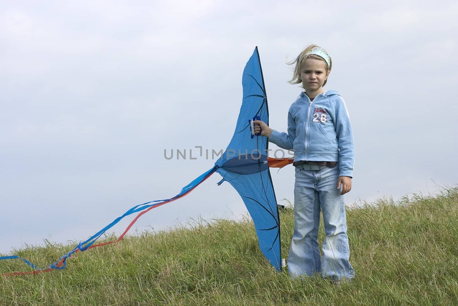 girl with kite in the open air
