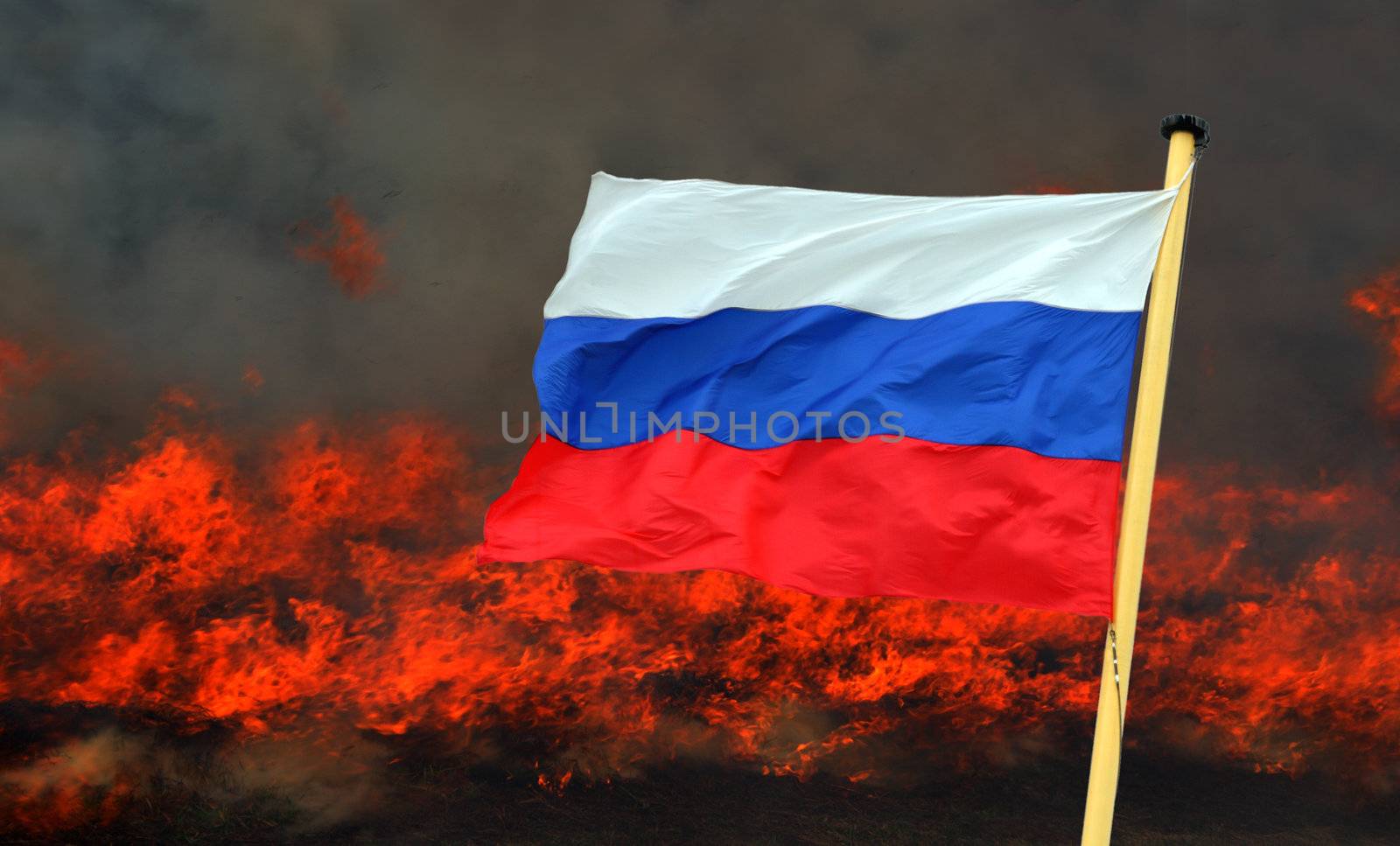russian national flag on fire background