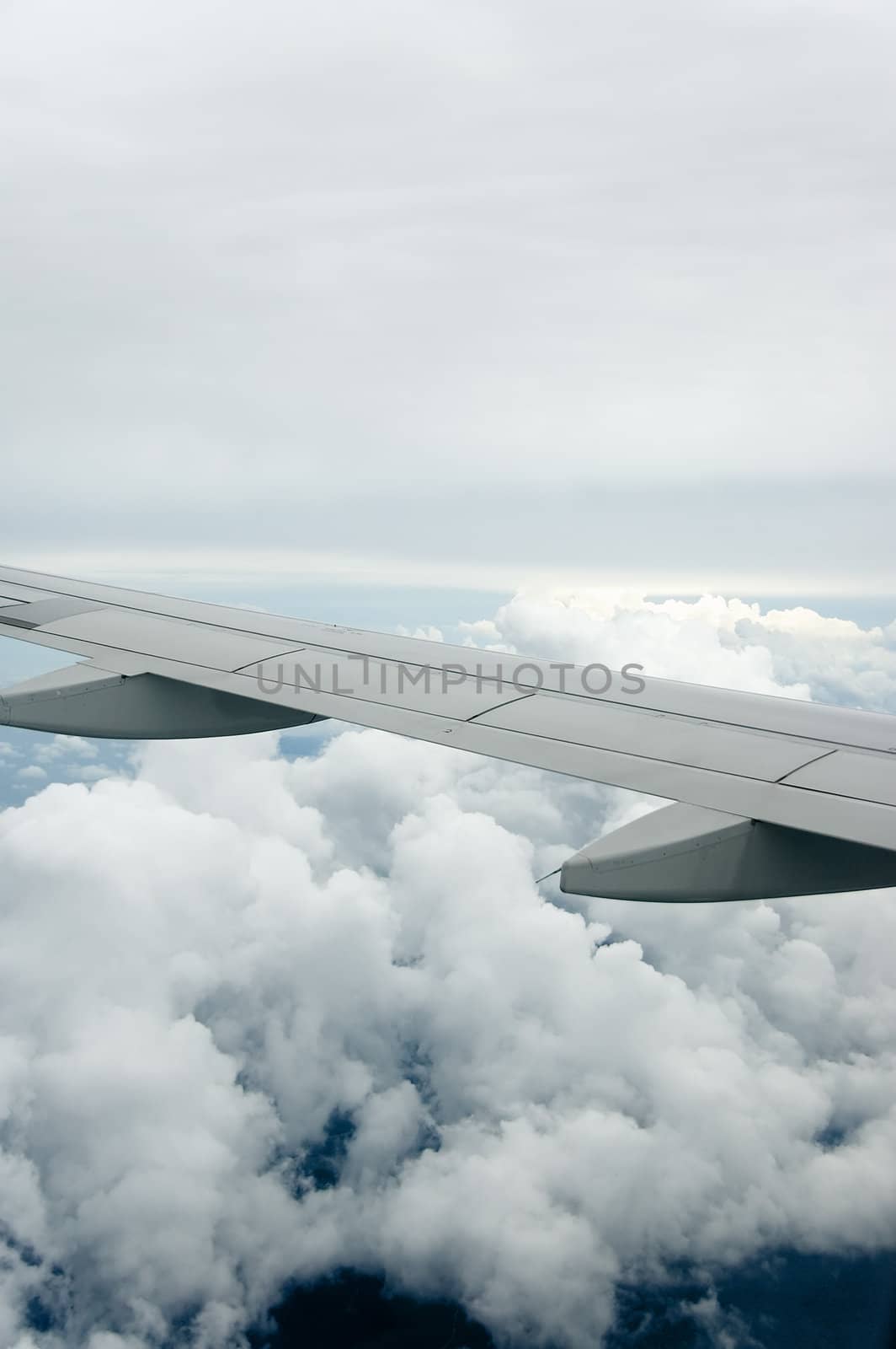 clouds and plane wing