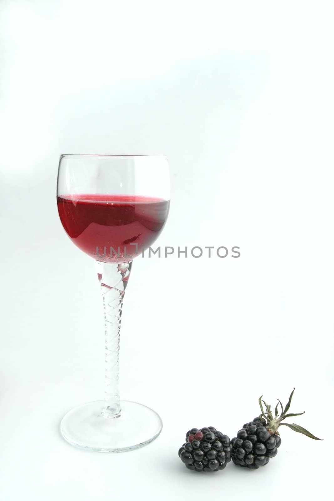 red liqueur on white background