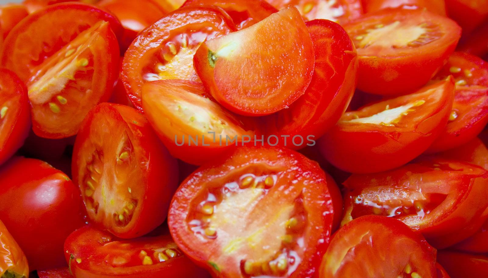 ripe perfect cuted tomatoes background