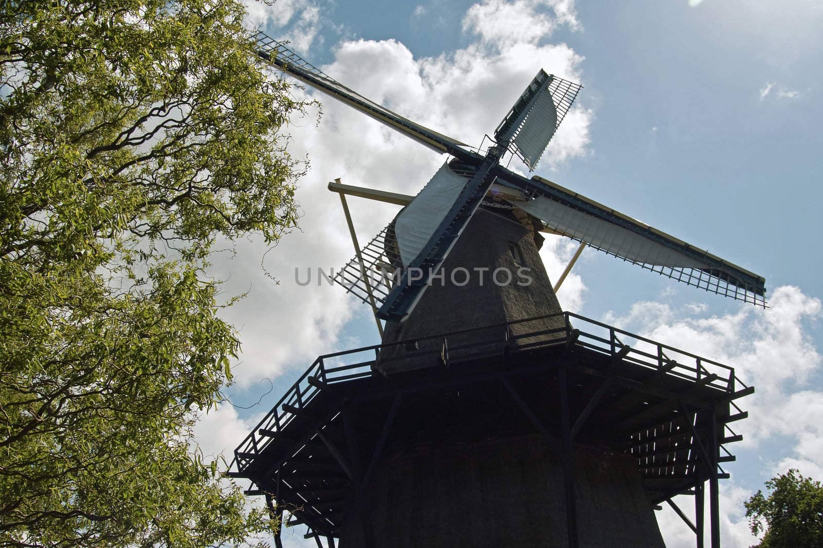 The Dutch windmill, the Zandhaas (the Sand-hare) on a sunny day. The windmill is still used for wheat grinding on a daily basis.