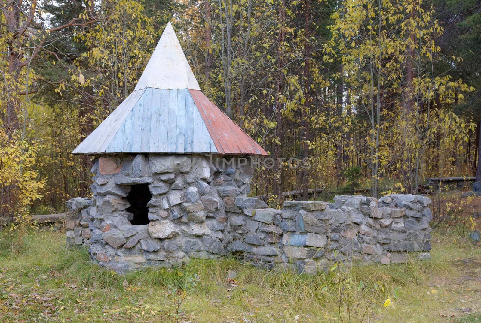 Old small stone tower constructed in wood