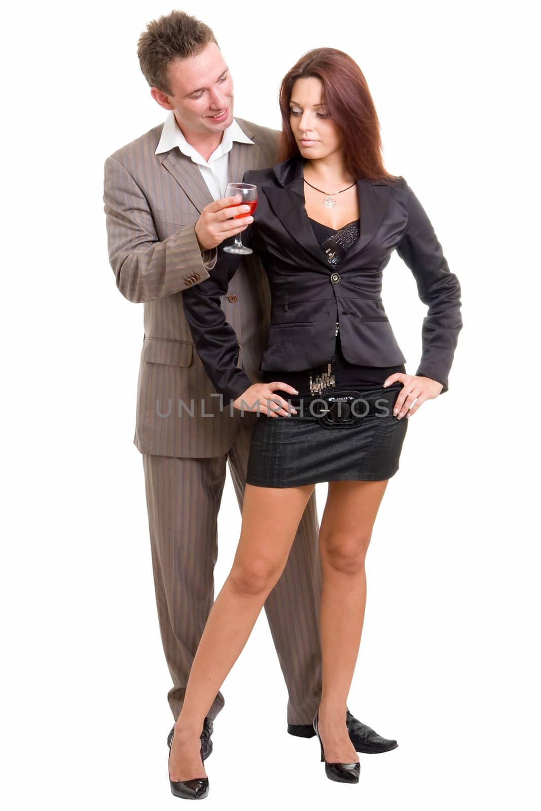 Loving couple with wine on a white background