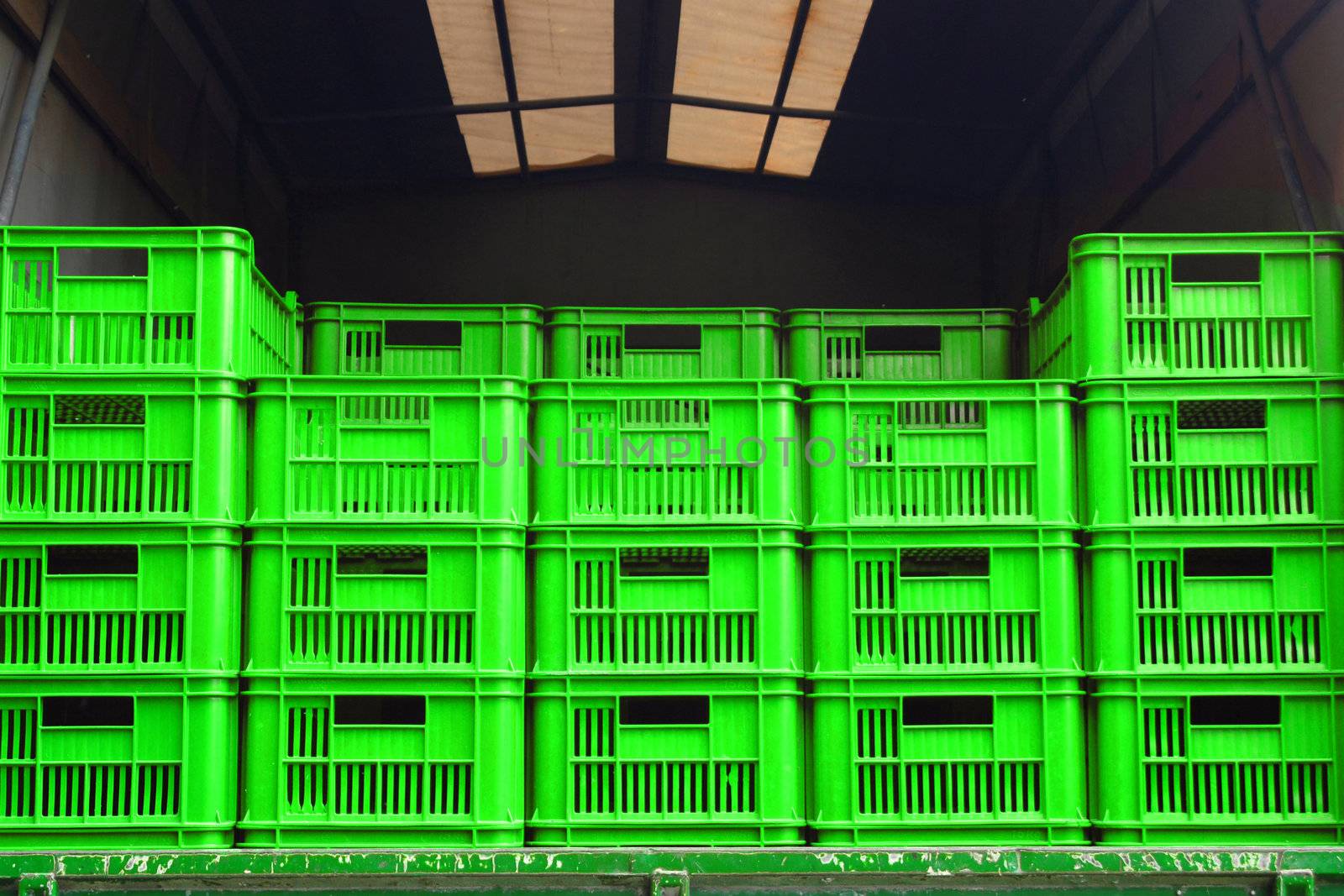 Green delivery boxes in the truck