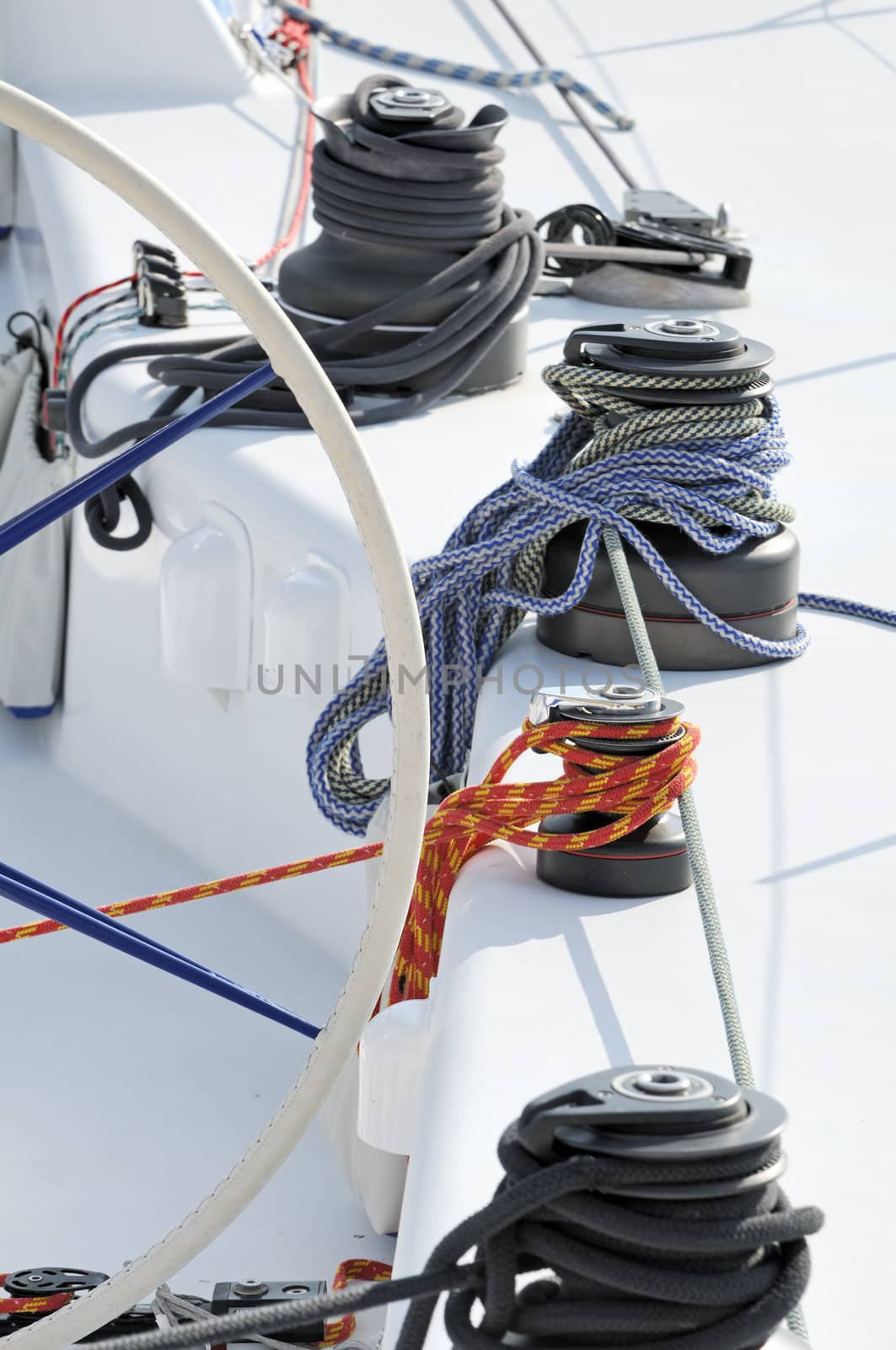 Detail of a sailboat with winches and ropes