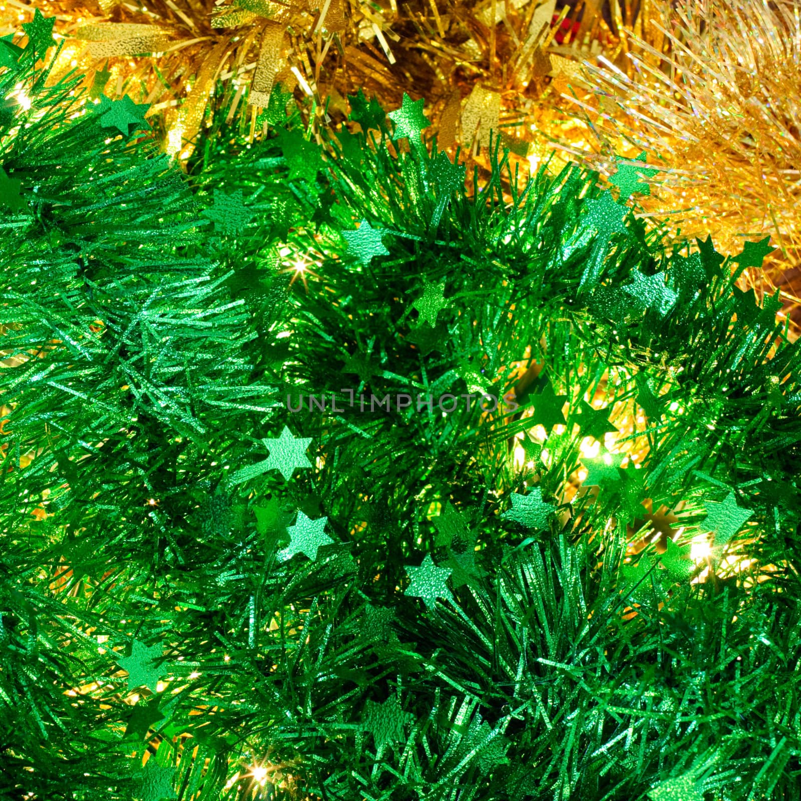 Christmas green and yellow tinsel with lights