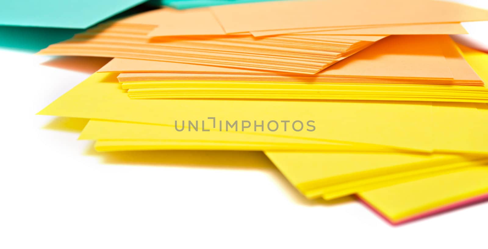 Pile of a pure paper for notes on a white background. Isolation, shallow DOF