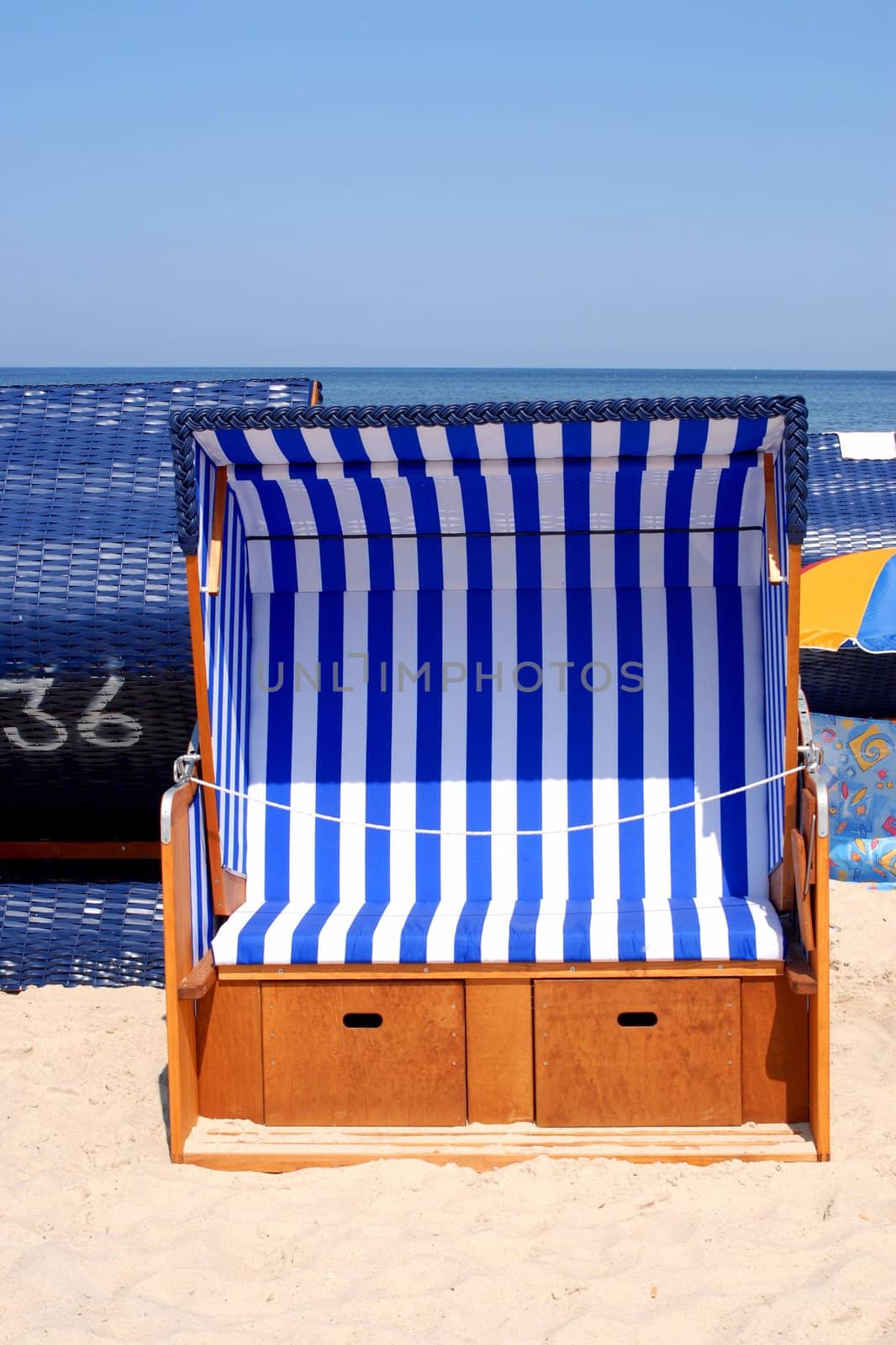 A basket chair on the beach