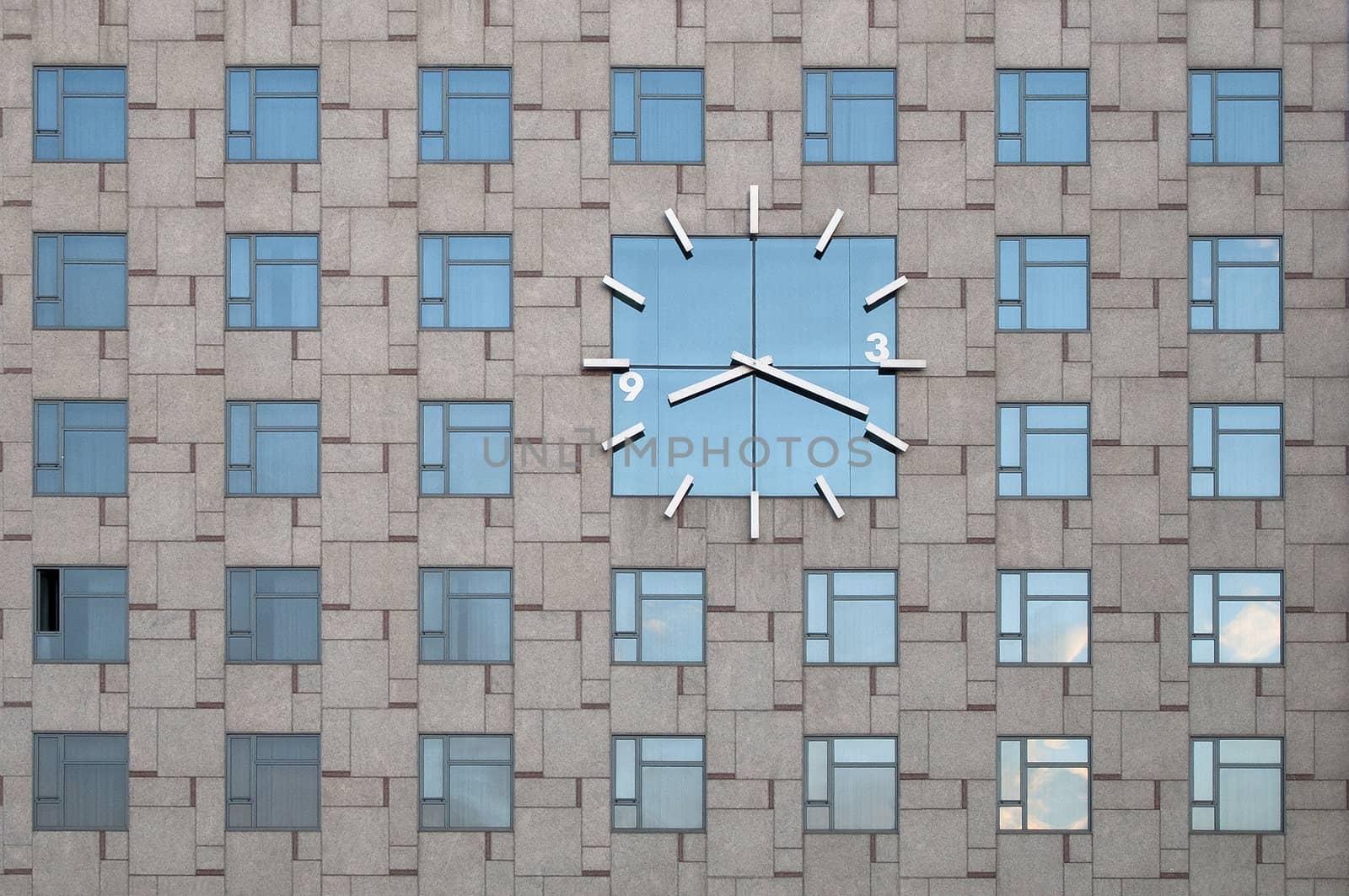 Huge mirror clock on the wall