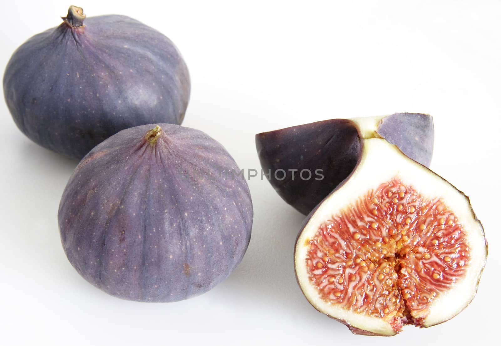 two whole figs and one cut in half