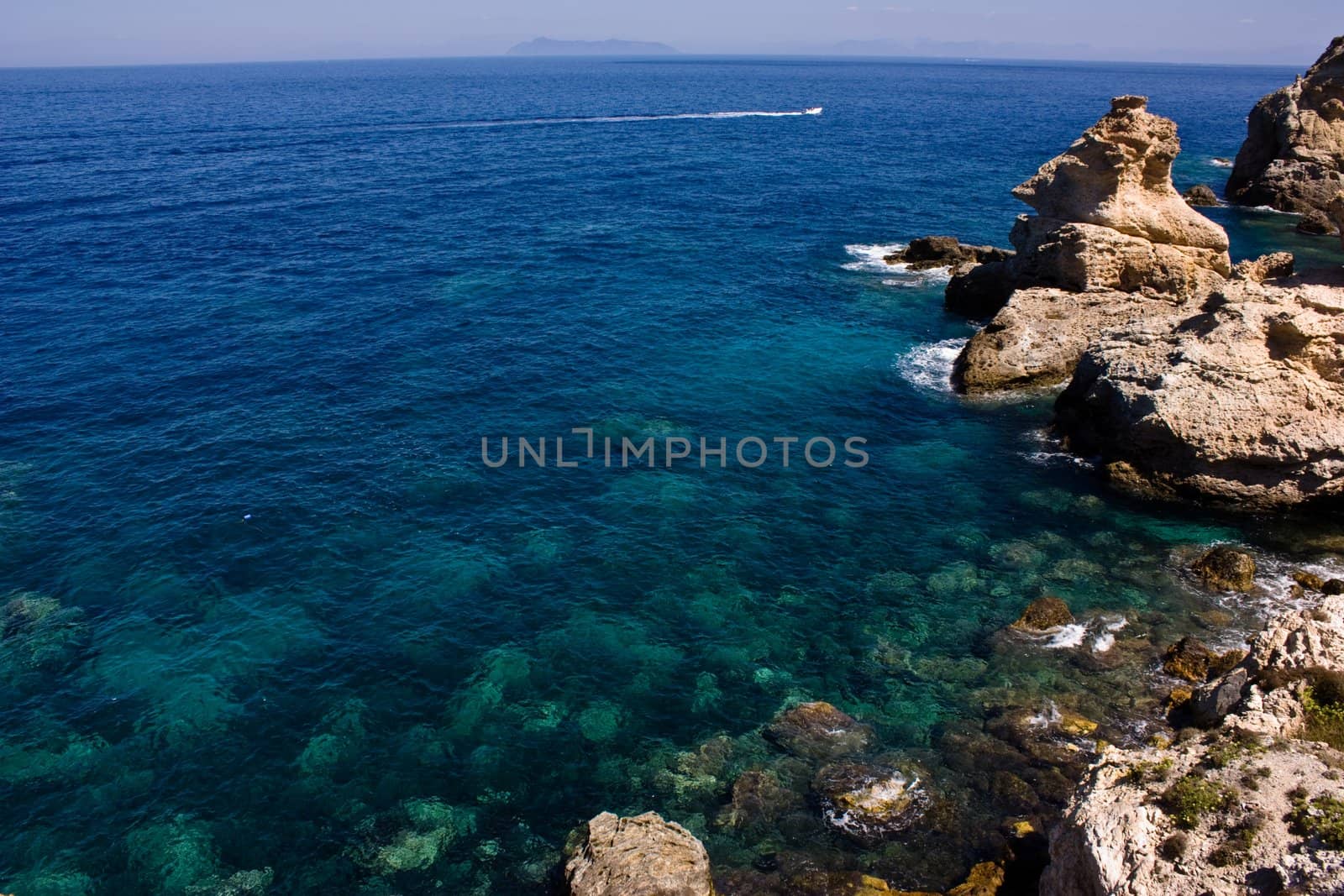 Looking out to sea from the top of a rocky cliff at Ponza island