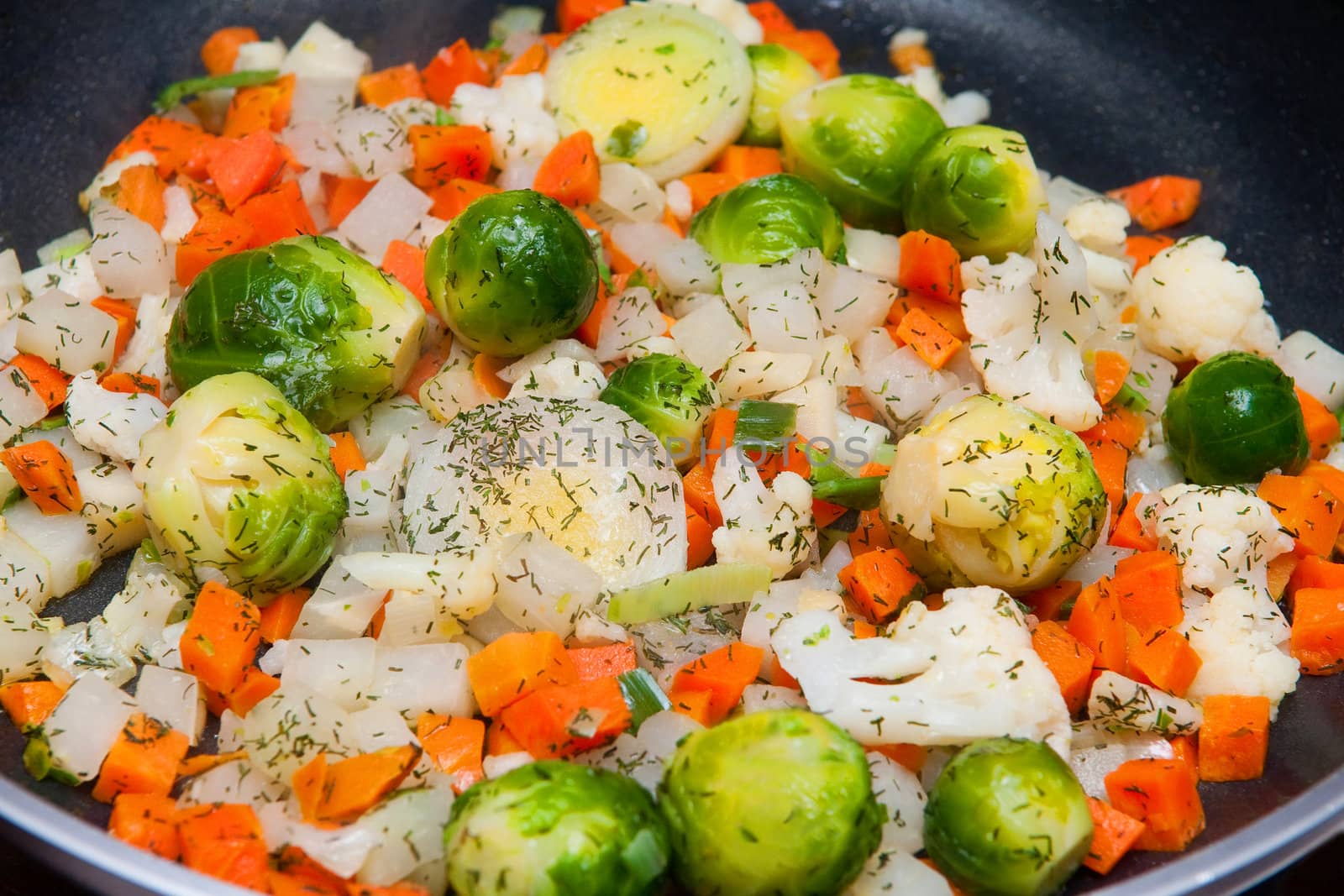 Fresh vegetables on the frying pan