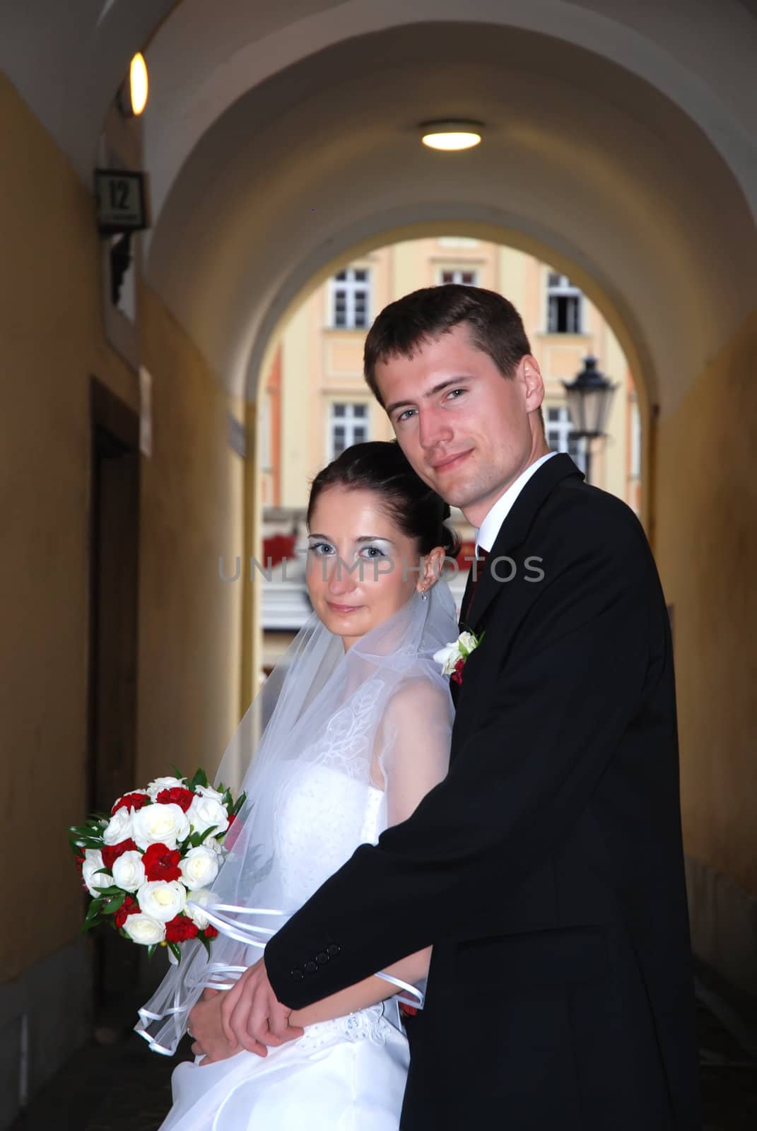 Young wedding couple just married in city hall