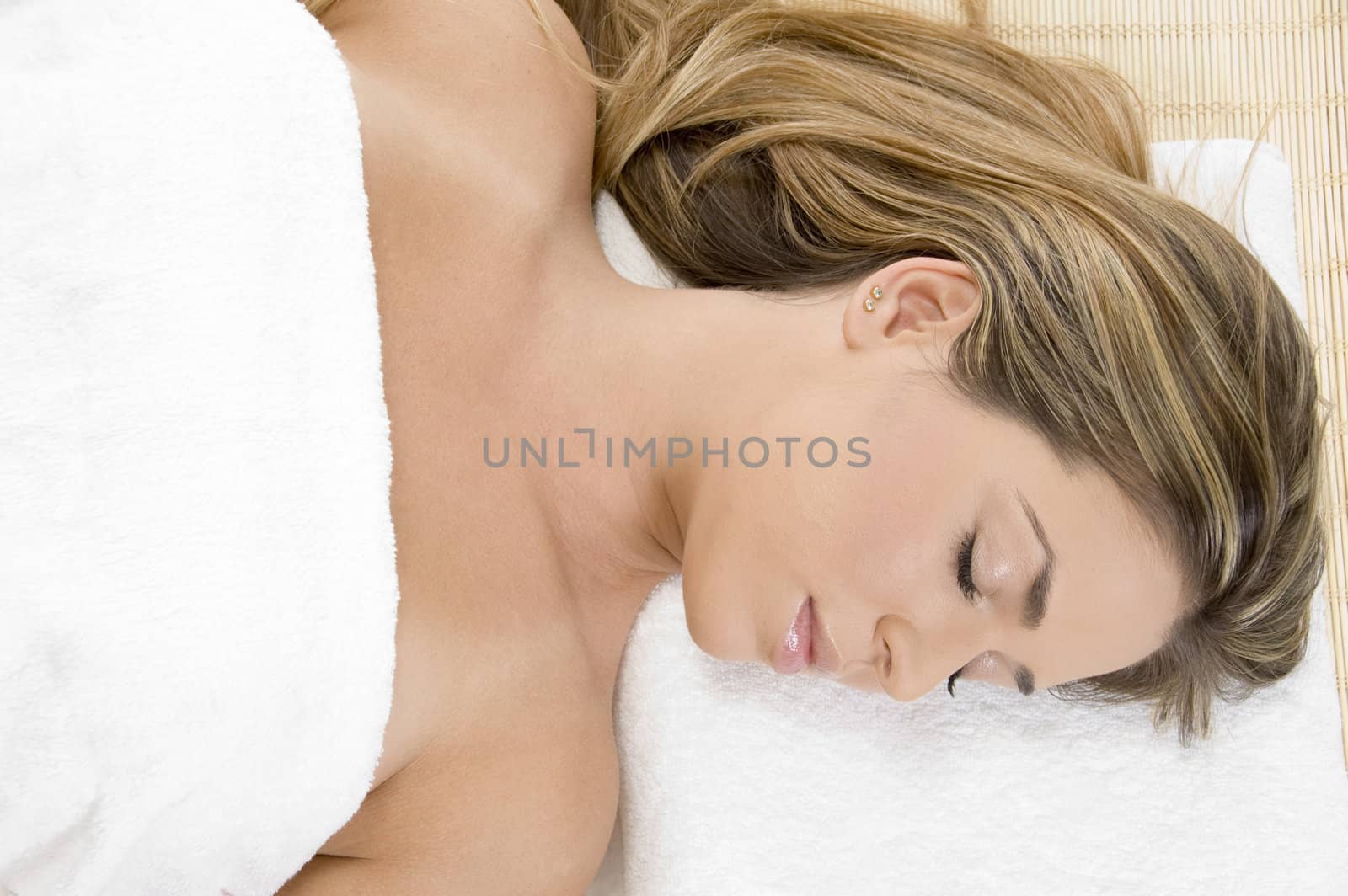 sleeping young female in towel