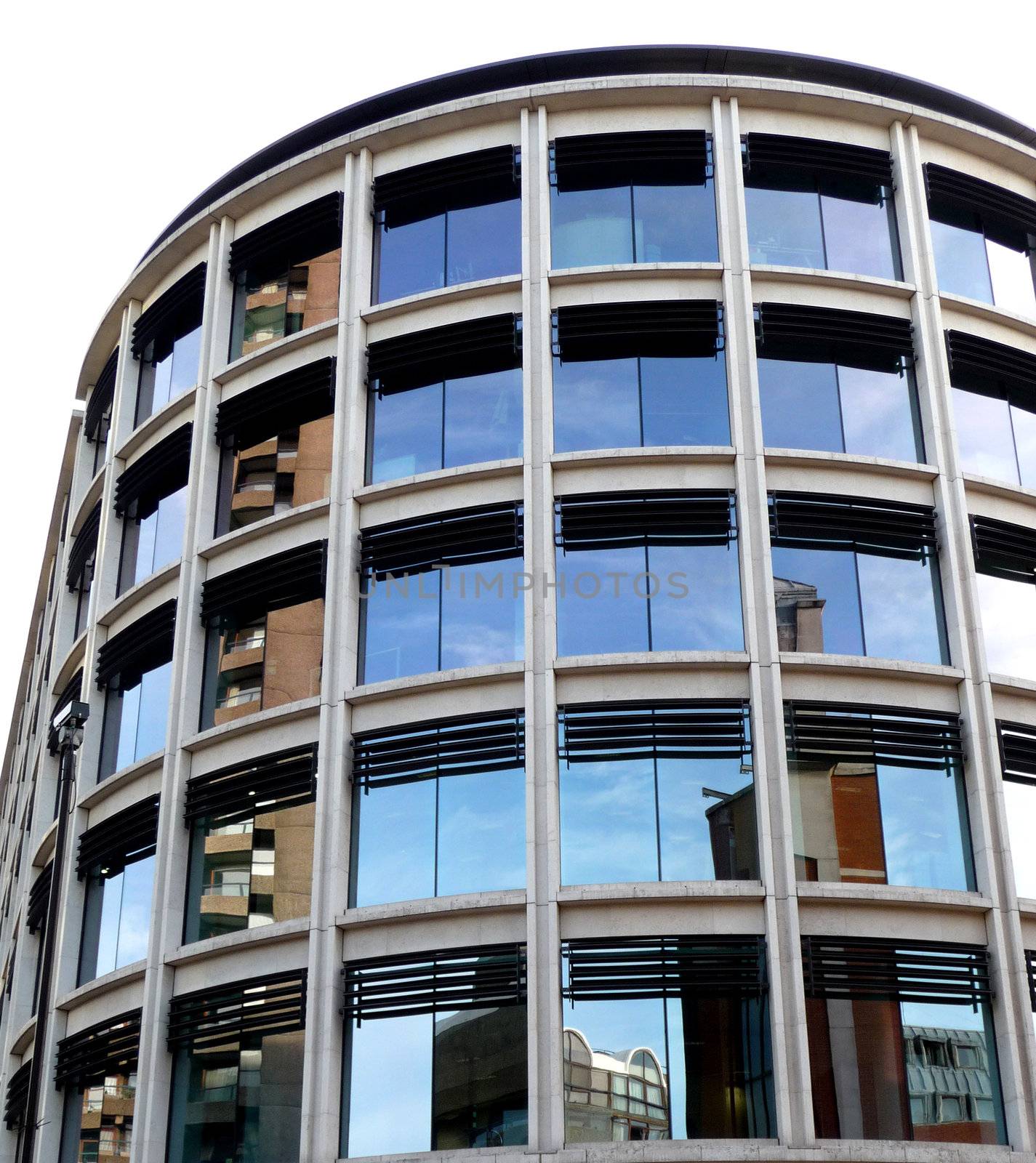 A modern office building that is curved.