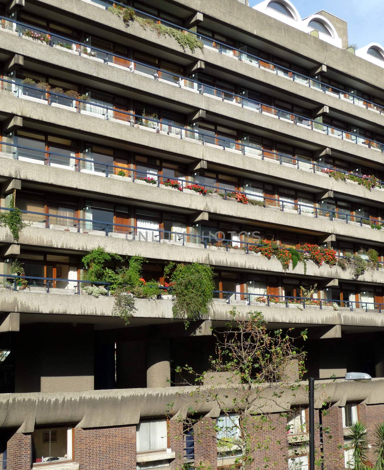 The side of a block of flats that are designed in the brutalist style.