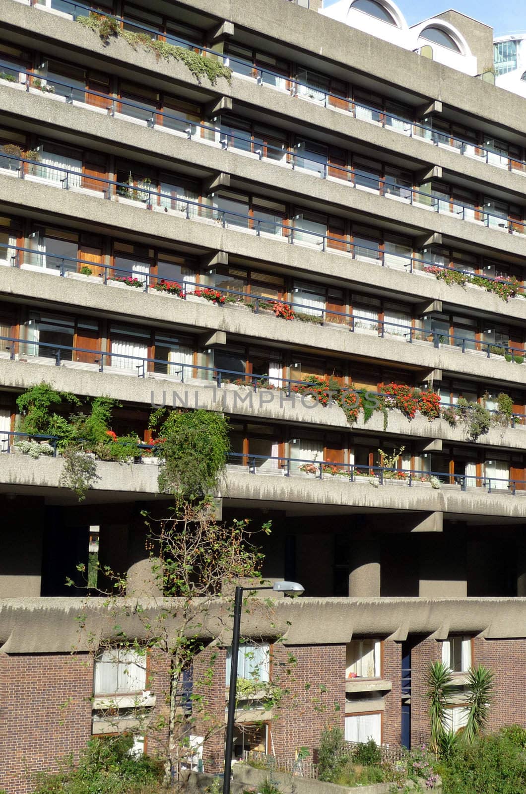 The side of a block of flats that are designed in the brutalist style.
