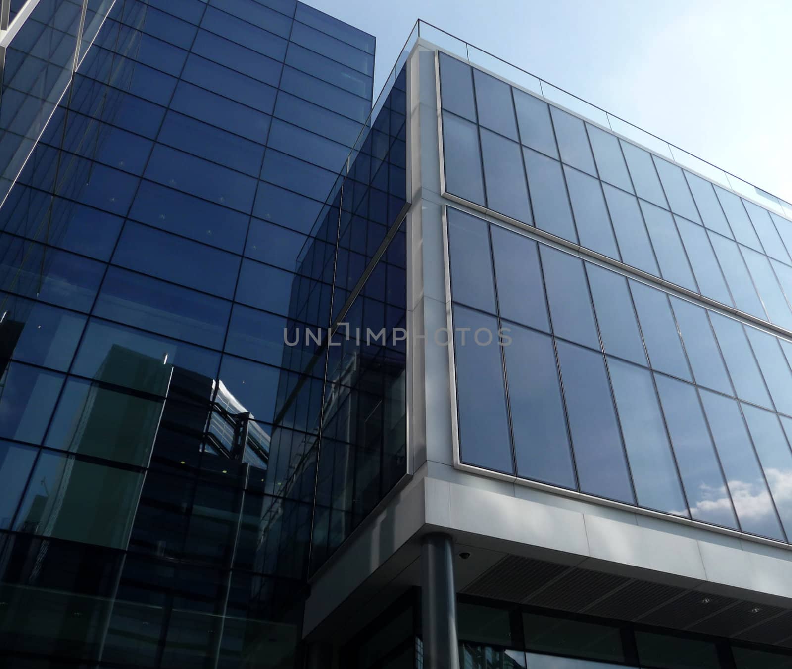 A modern glass building in central London.