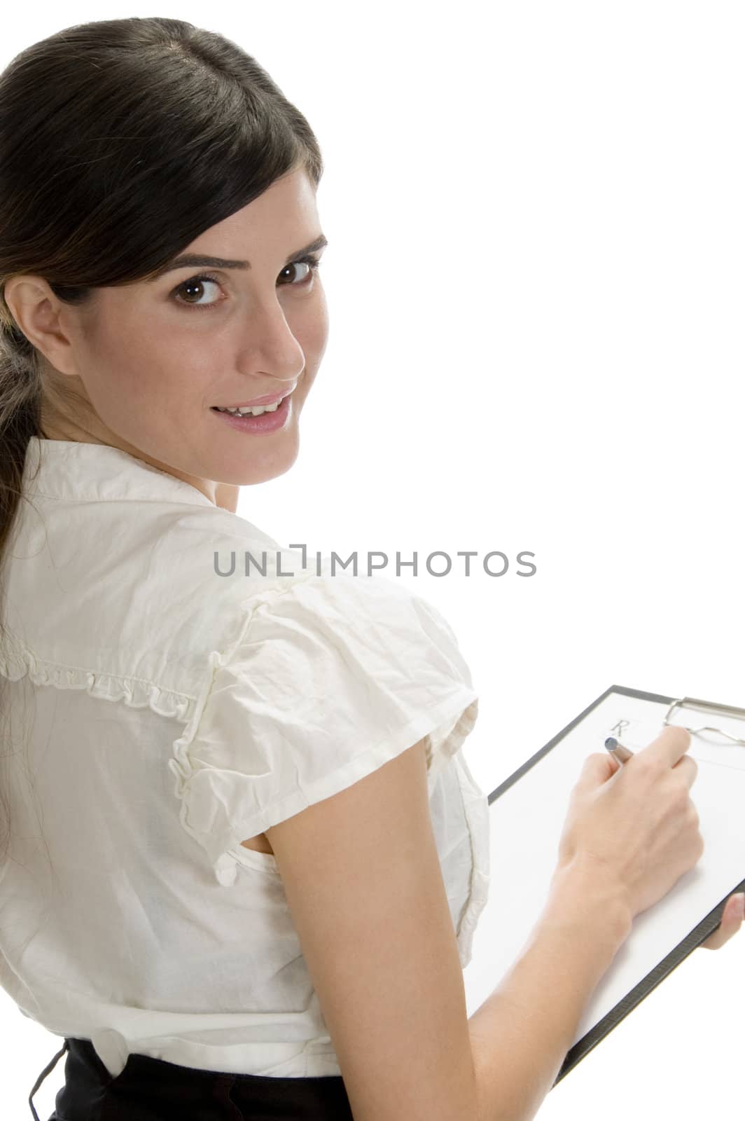 smiling lady with pen and paper in writing pad on an isolated background