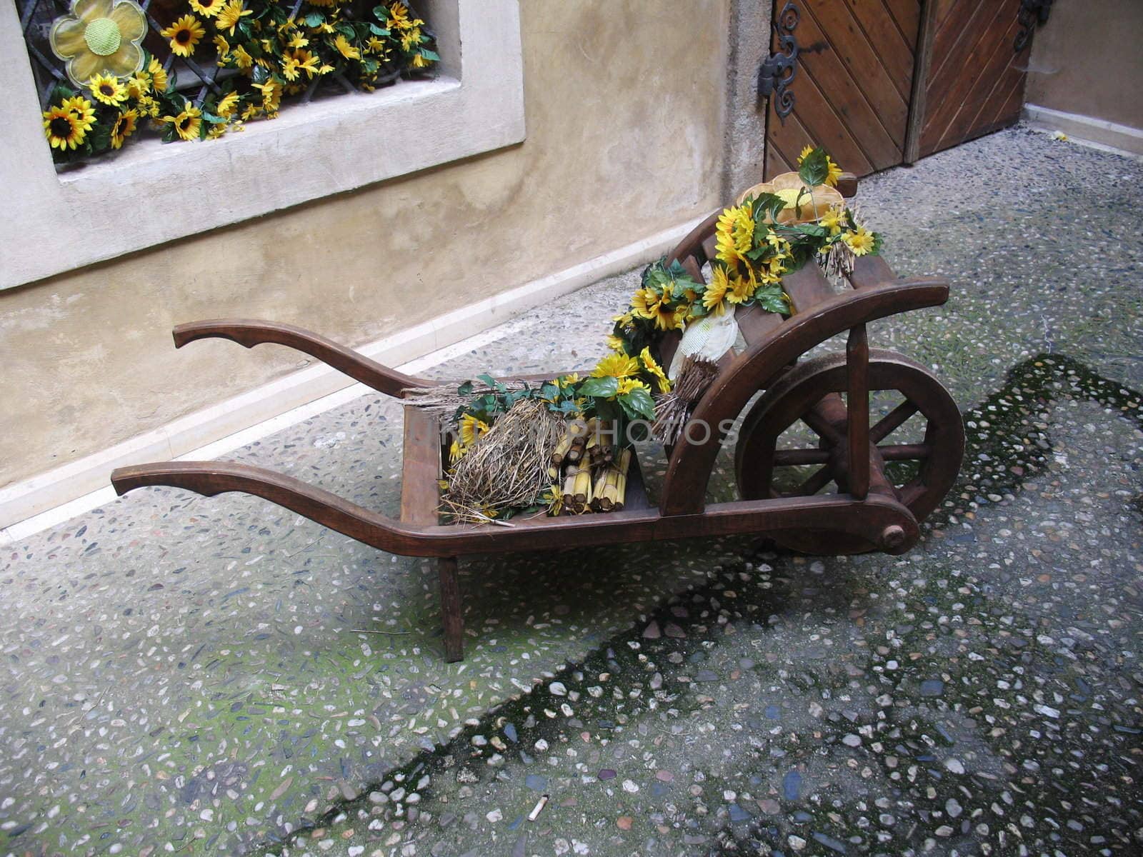 Decorated wheelbarrow by Vitamin