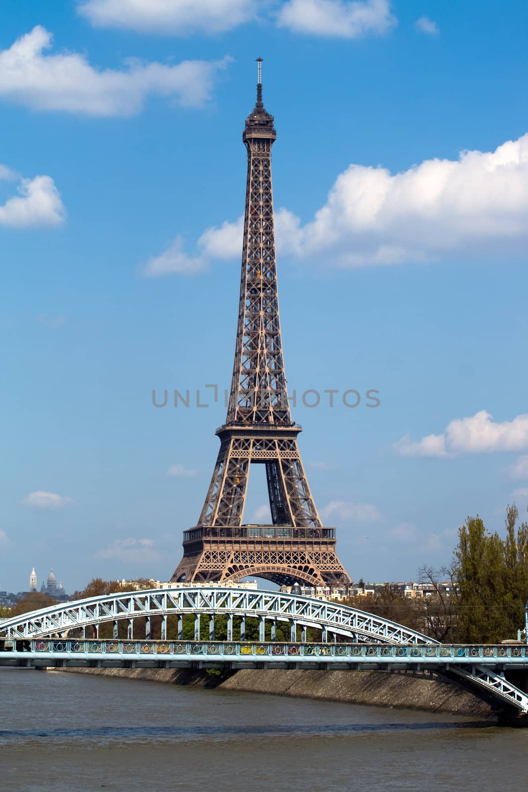Eifel tower and railway bridge in Paris by ints