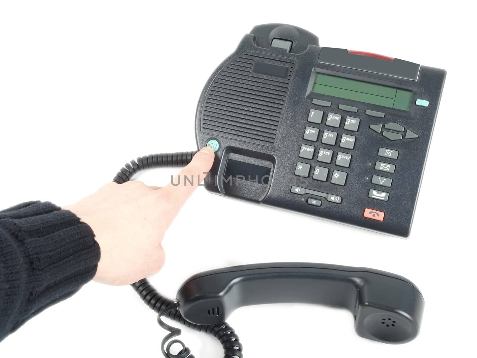 Office black telephone with hand isolated on white 