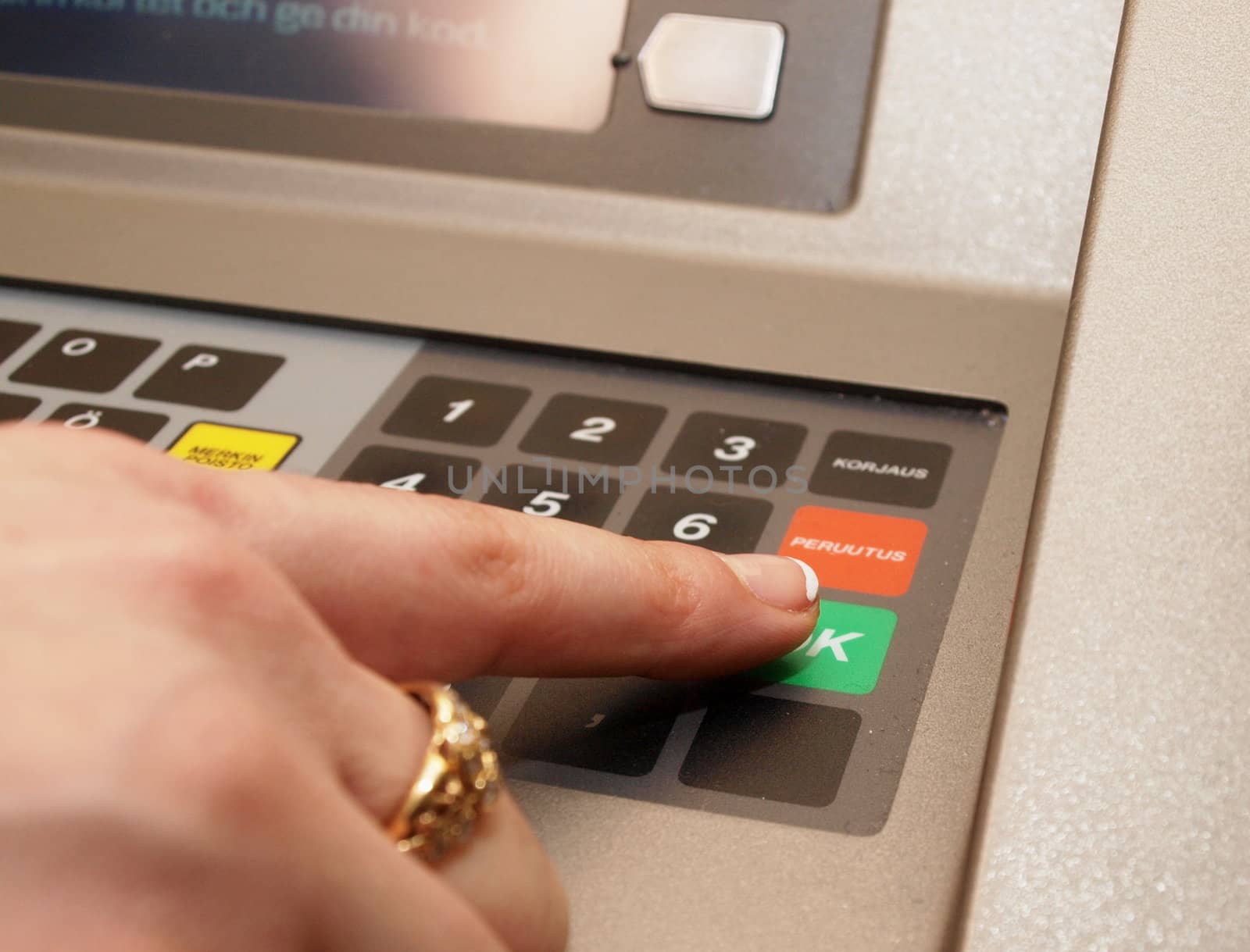 ATM dials - someone pressing OK button