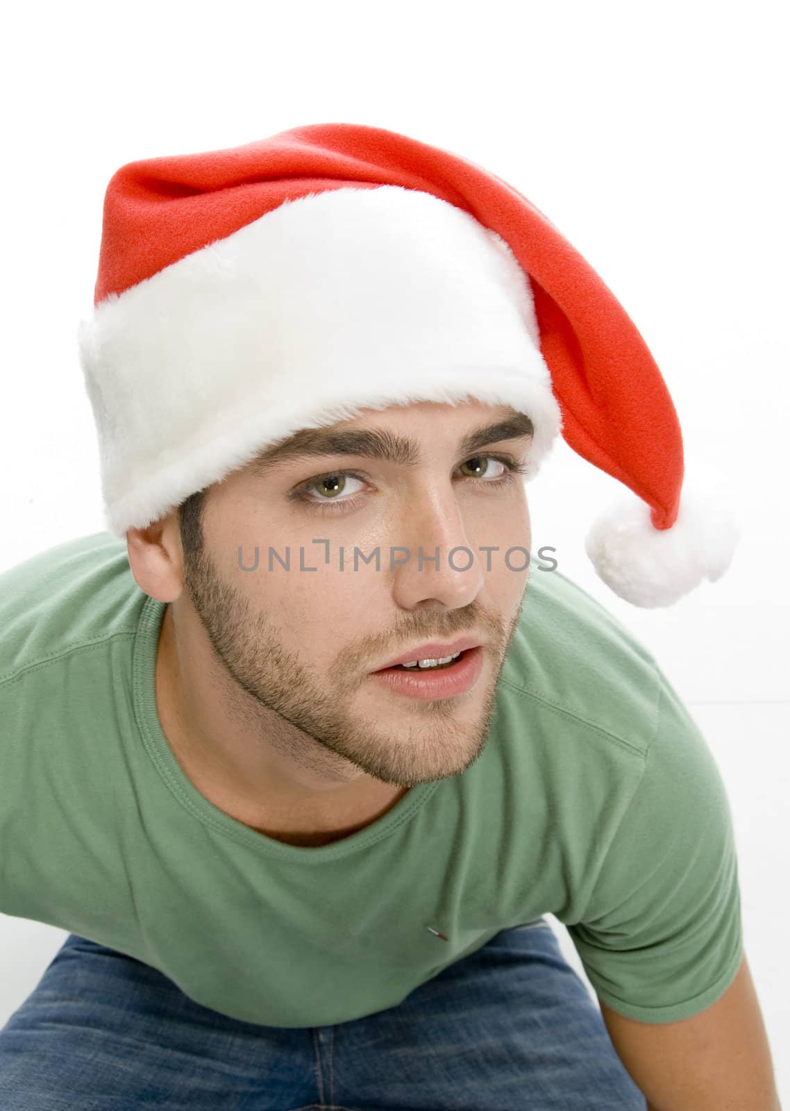 young male looking into camera on an isolated white background