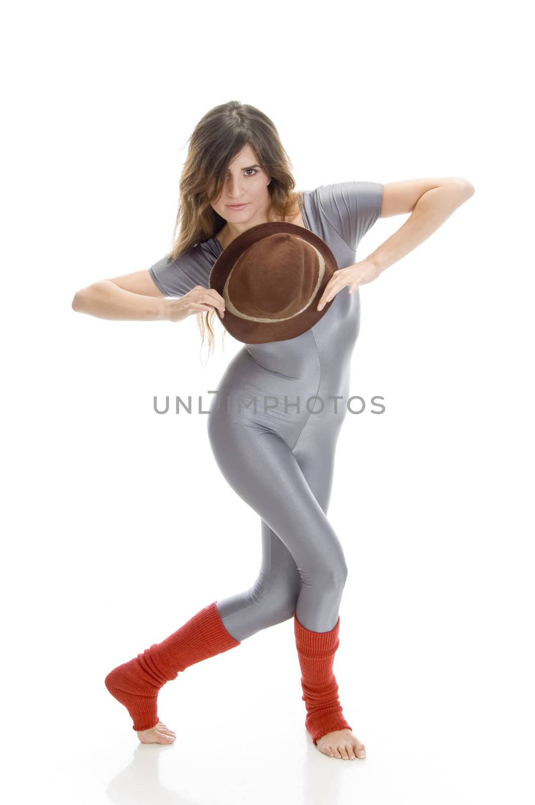 woman posing with hat against white background