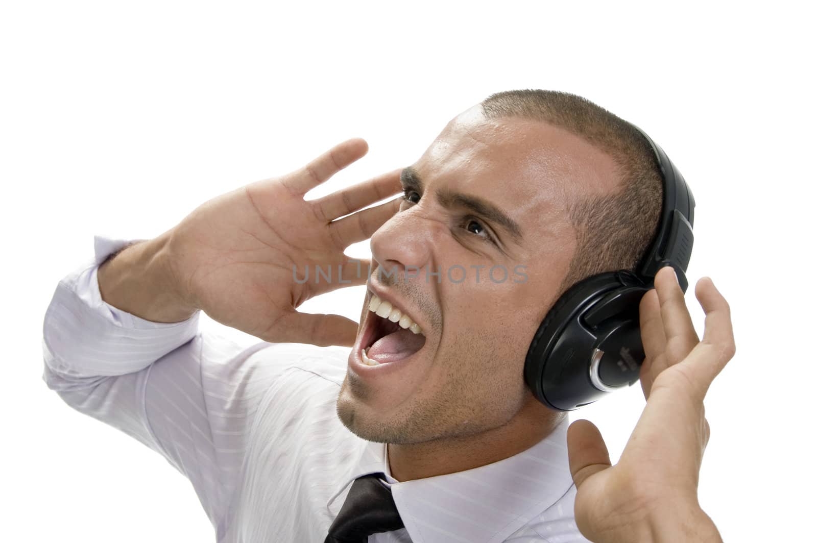 shouting businessman with headphone on an isolated background
