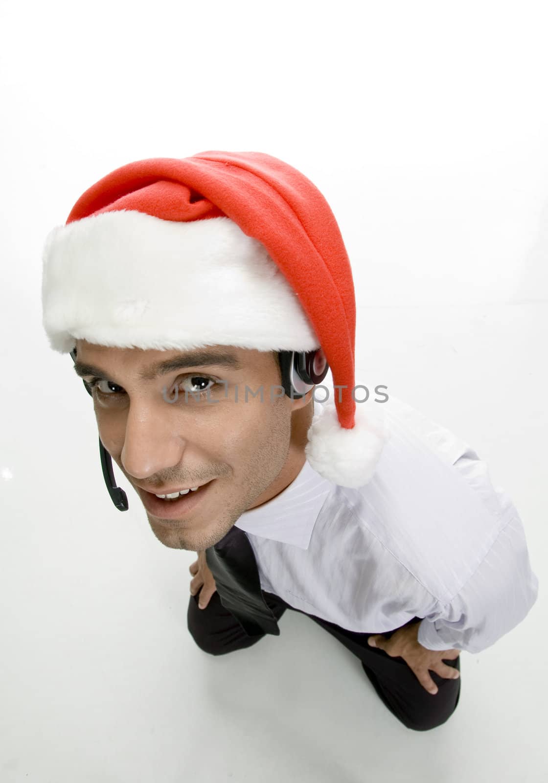 businessman with headphone and santa cap with white background