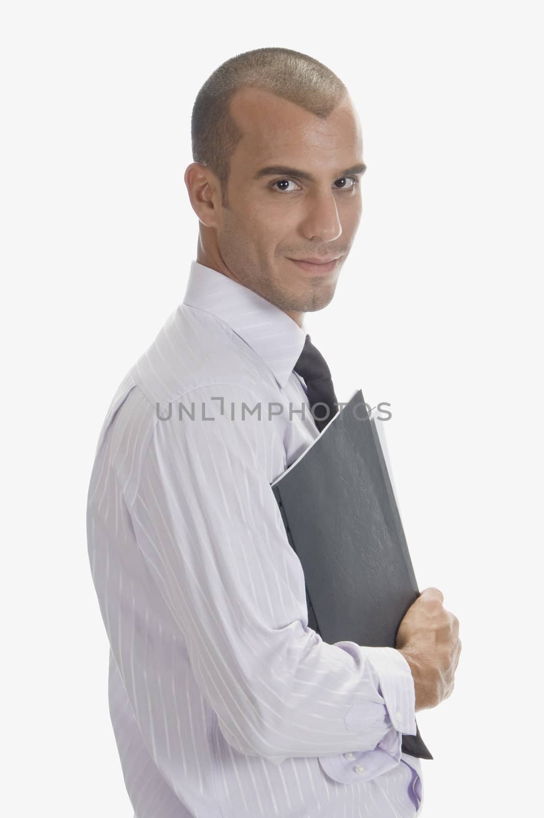 smiling young professional man posing by imagerymajestic