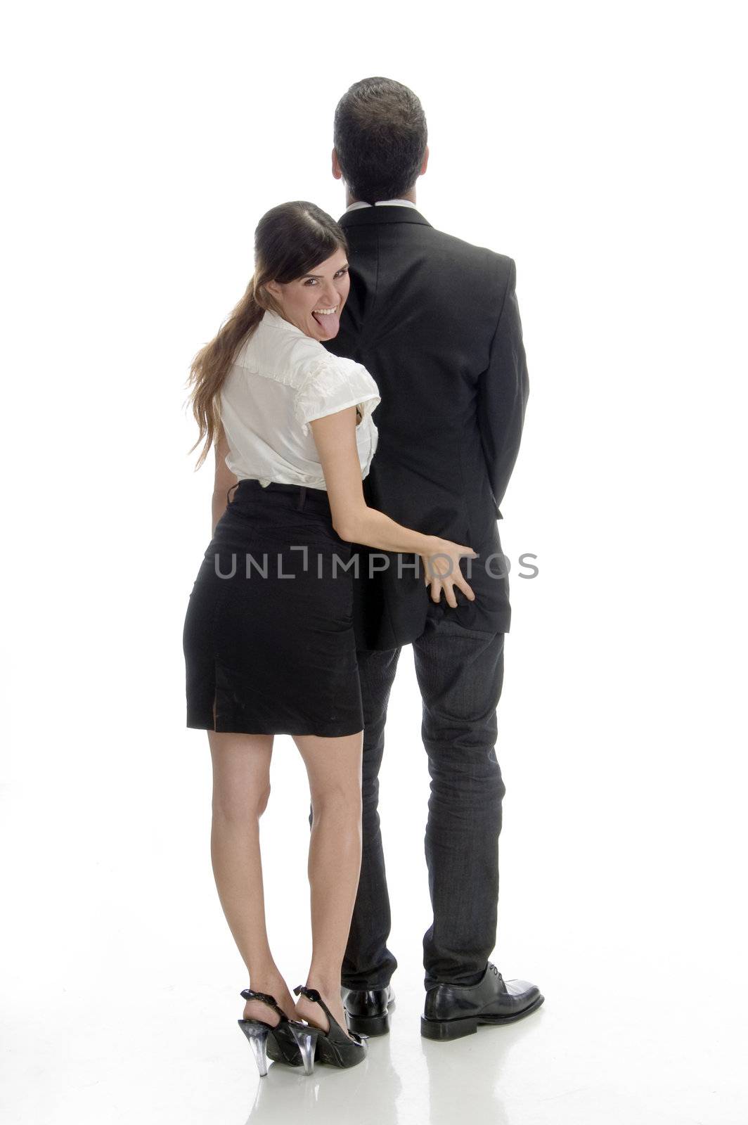 sexy woman pushing man's back isolated on white background