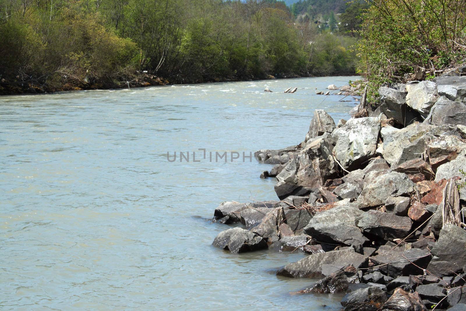 mountain river in the Alps during the spring