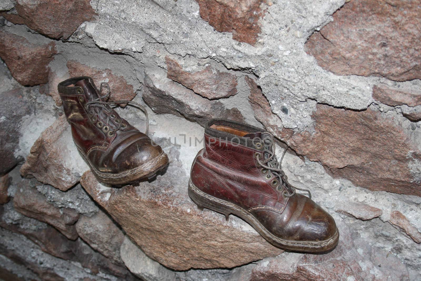 old climbing shoes in the museum of saint firmiano