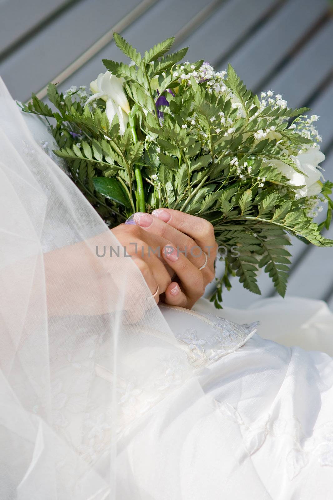 Bridal Bouquet in woman hands. #1
