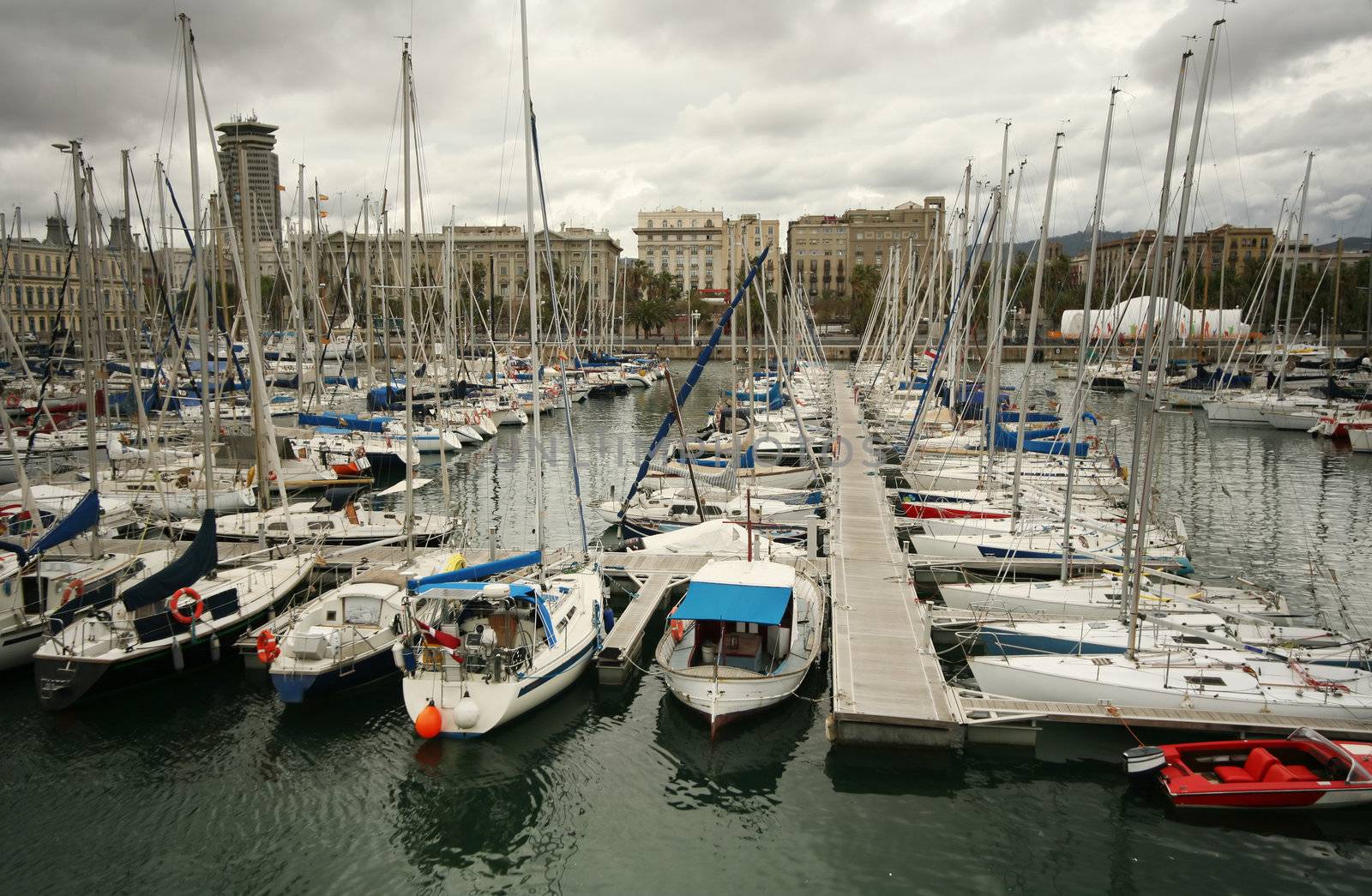 Tall luxury boats and yachts moored in duquesa Port In Spain. Barcelona
