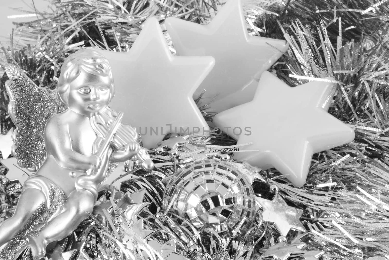 Close up of different kinds of christmas ornaments in black and white.          