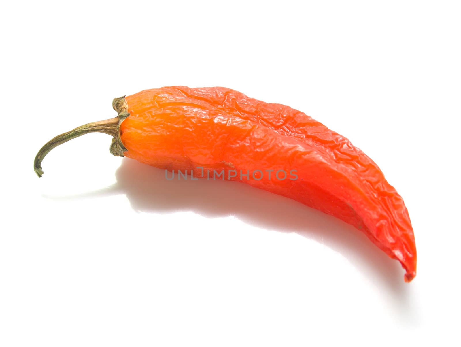 Red pepper on a white background. Isolation, shallow DOF