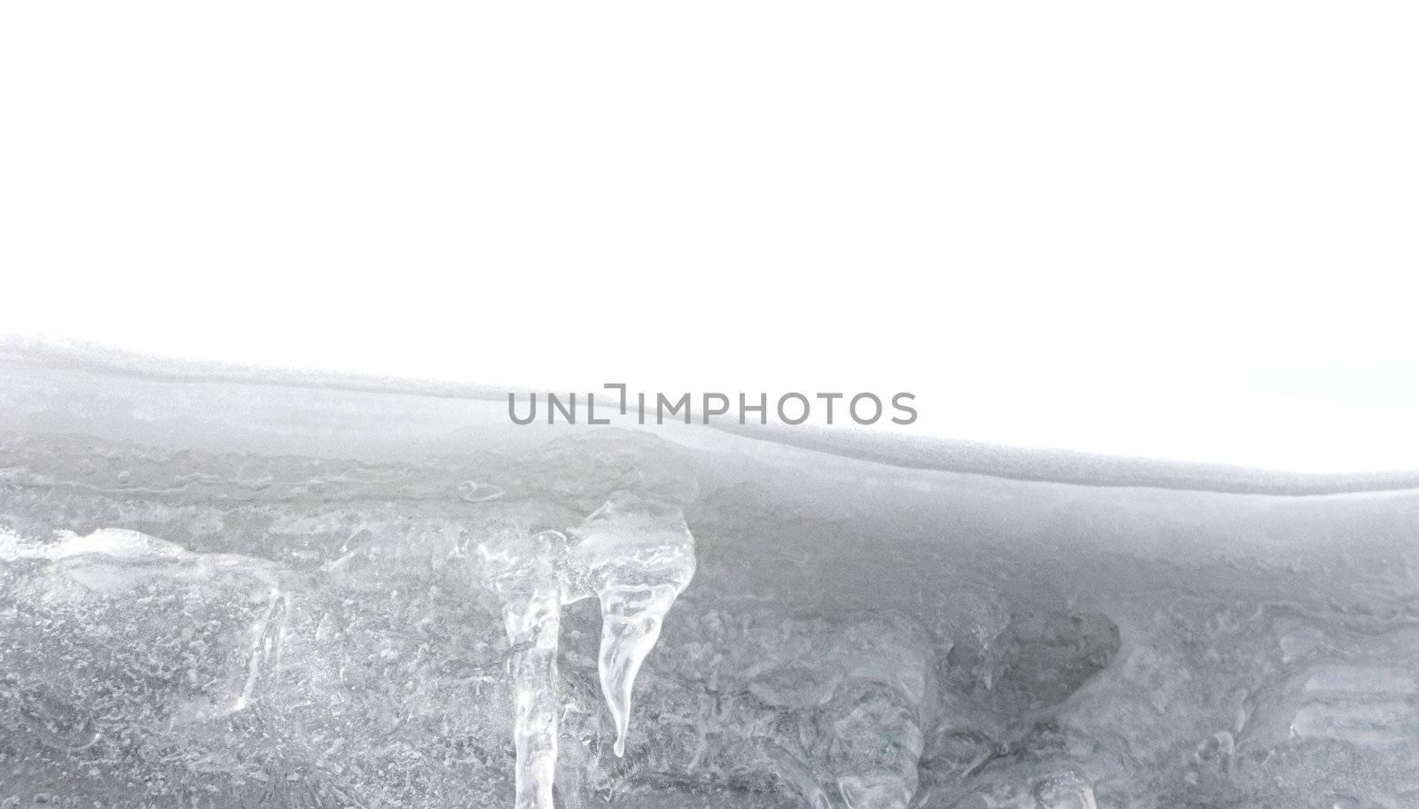  Ice stalactites on the side of a roof