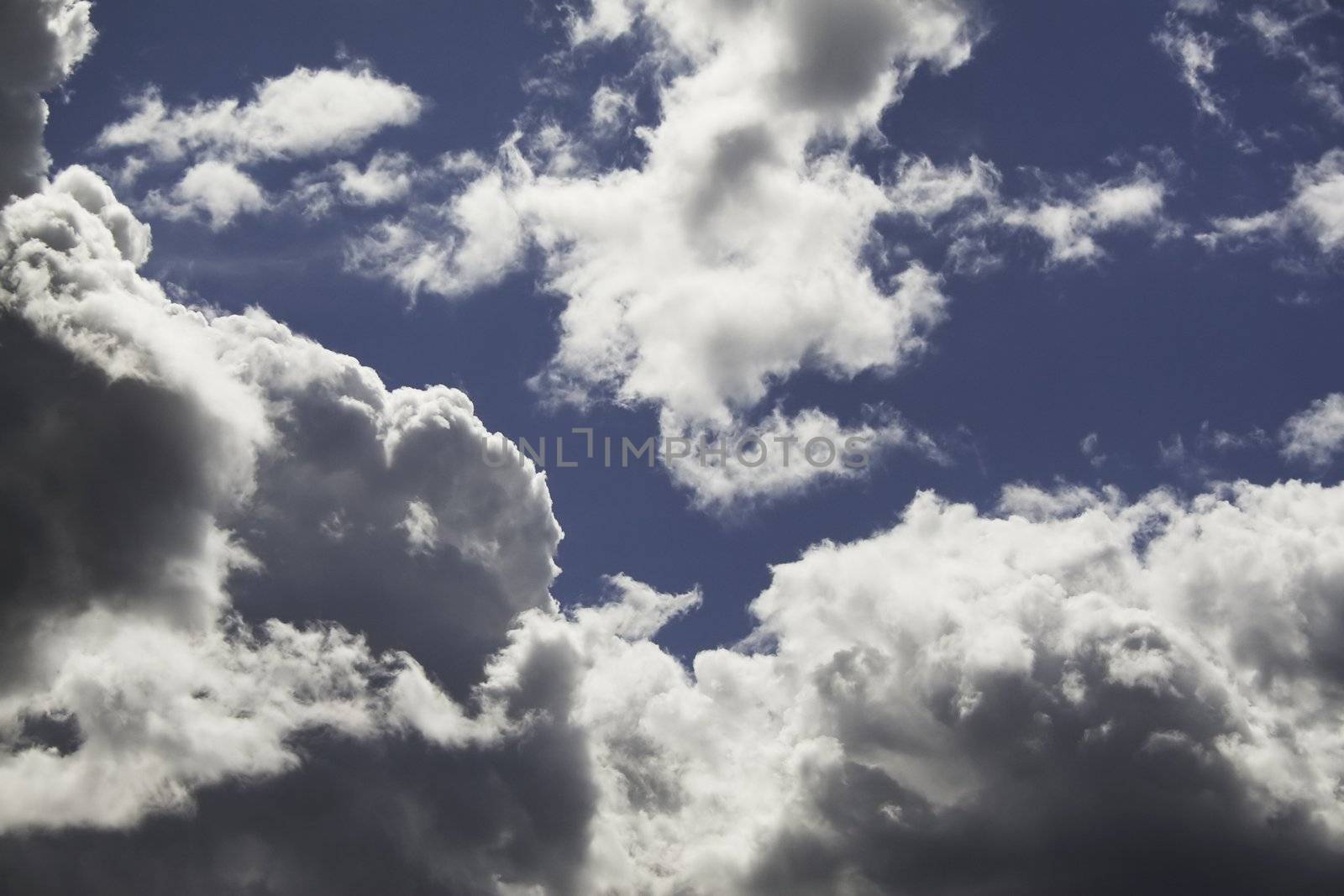 Storm Clouds on Blue Sky in Summer by suwanneeredhead